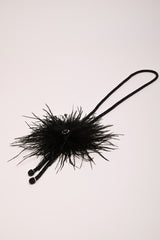Collana lunga con piume