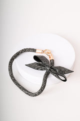 Portachiavi con strass e fiocco