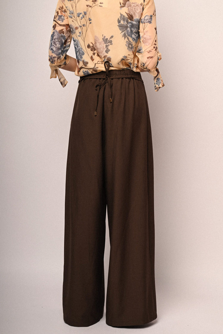 Pantaloni palazzo con pinces e rosa 3D