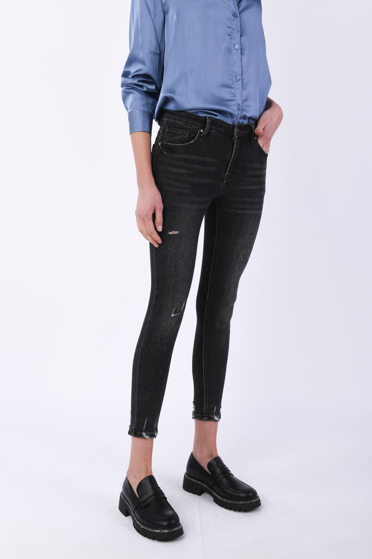 Jeans skinny con strappi