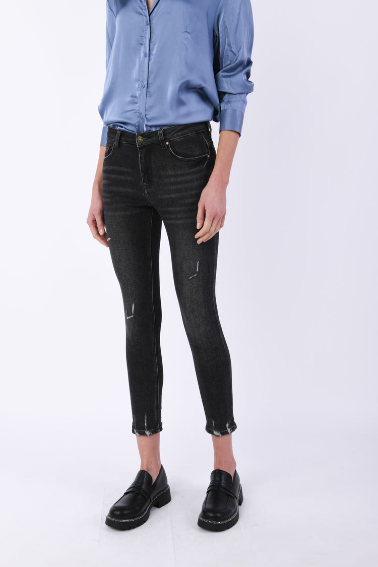 Jeans skinny con strappi