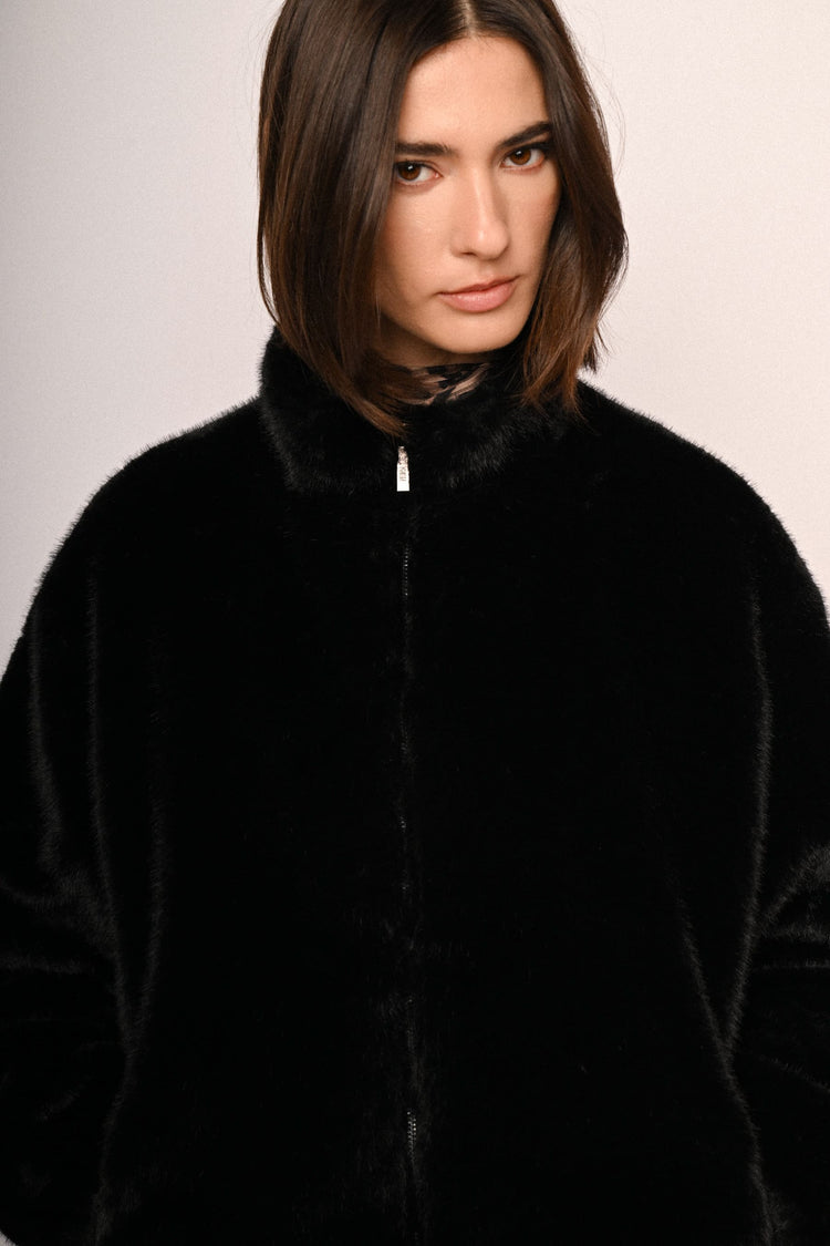 Giacca in faux fur con zip