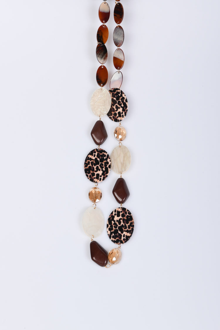 Collana lunga con pendenti