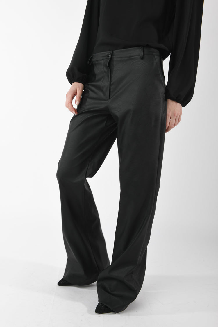 Pantaloni similpelle a zampa