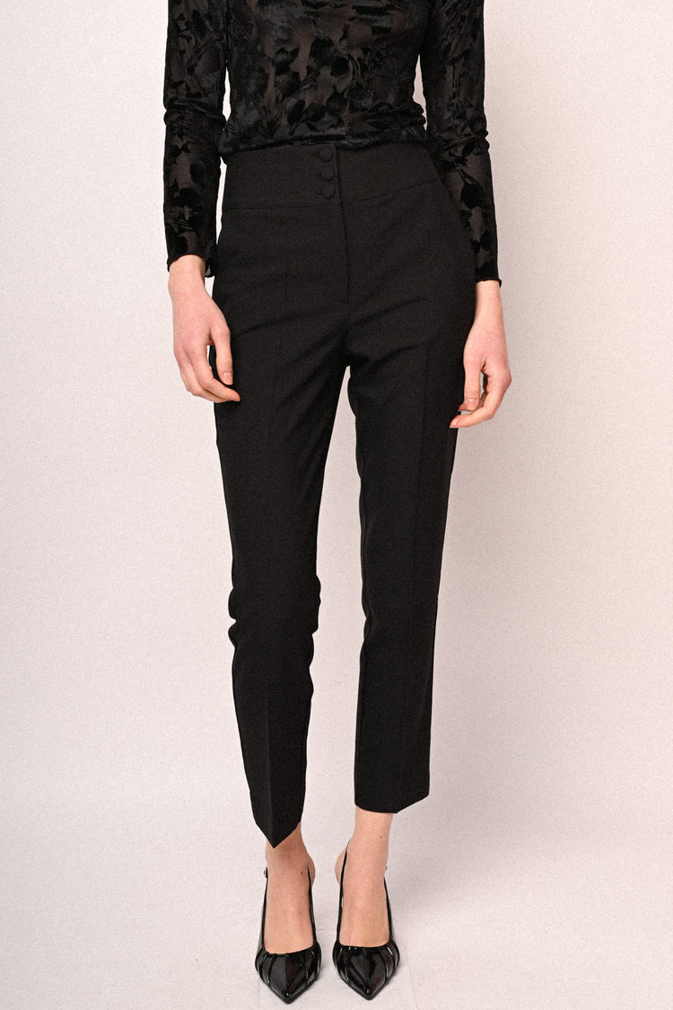 Pantaloni a sigaretta con piega stirata