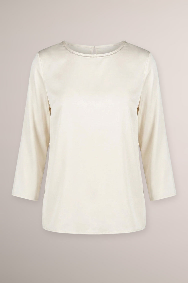 Blusa in raso bianco con scollo tondo profilato in strass