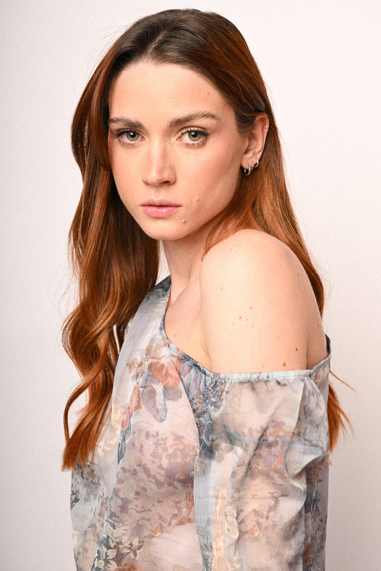 Blusa asimmetrica con stampa floreale