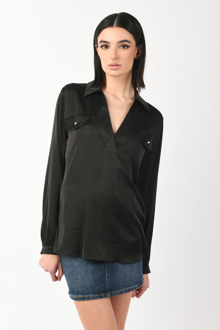 Blusa con taschini