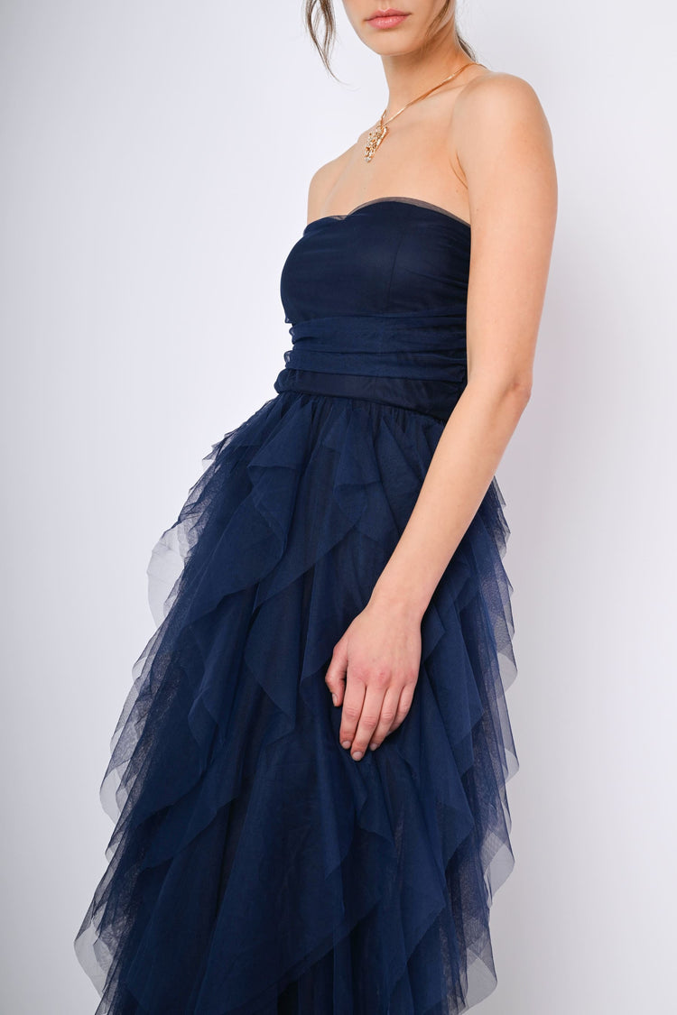 Abito lungo in tulle con volants