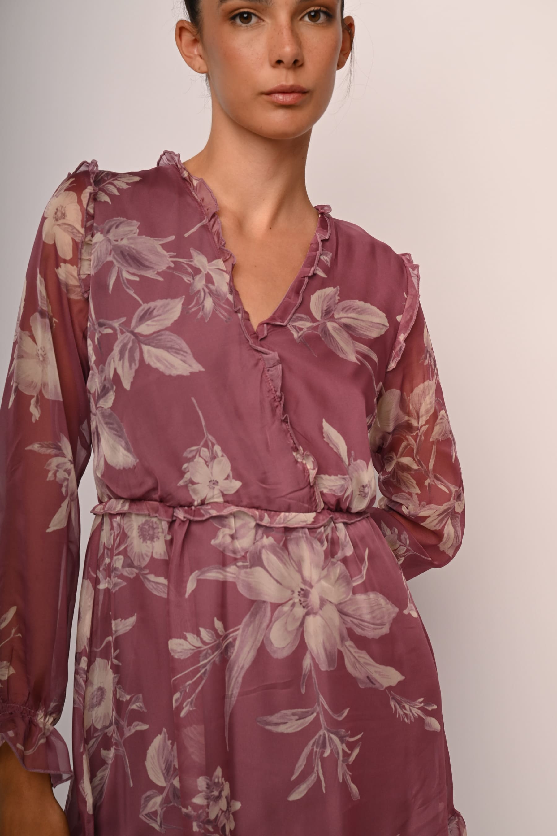 Abito con rouches a stampa floreale