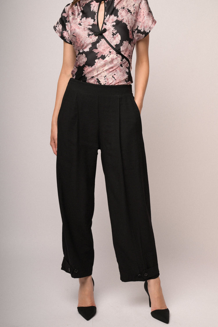 Pantaloni baggy con bottoni