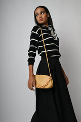 Pull a righe con fiocco sul retro