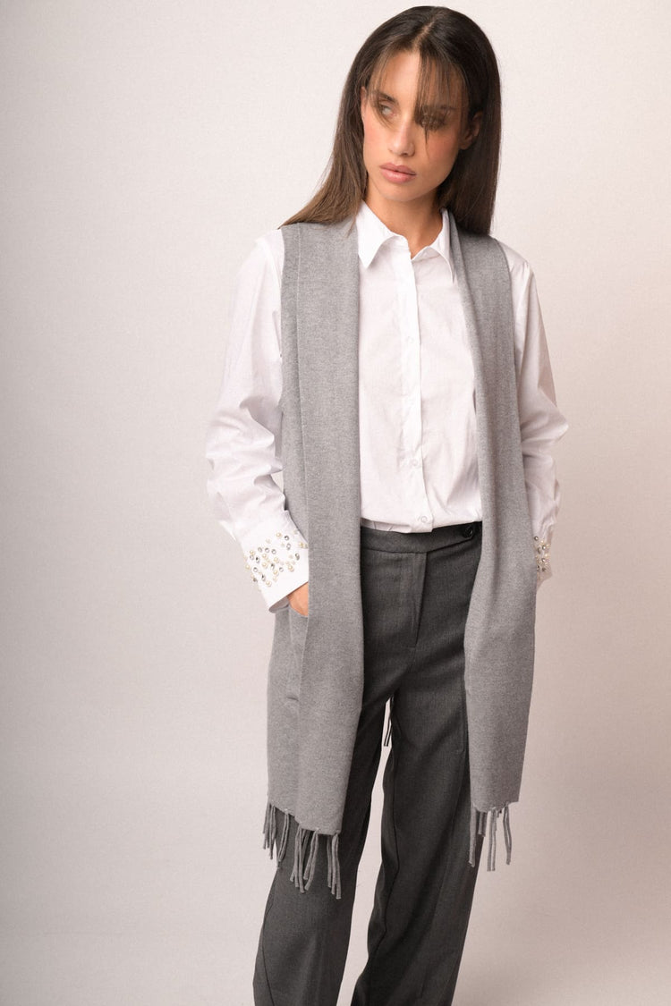 Gilet lungo con frange