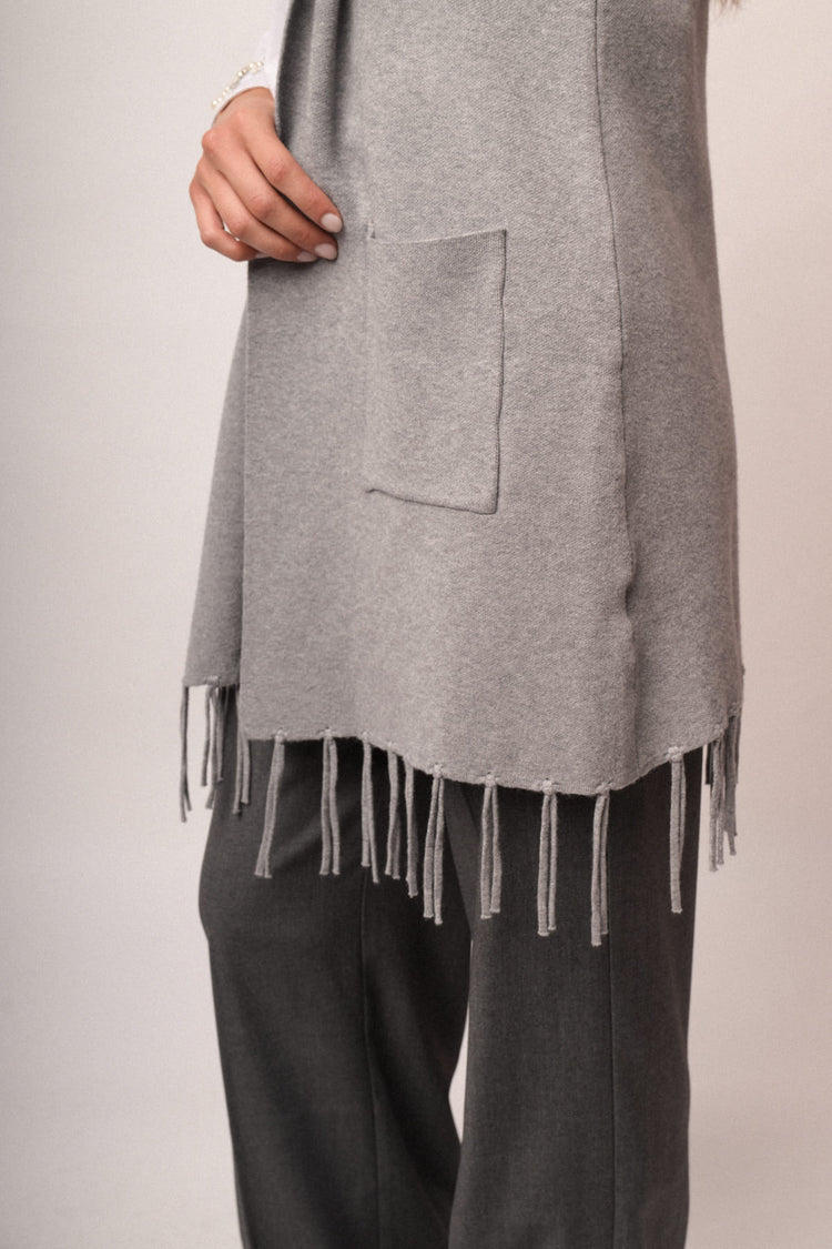 Gilet lungo con frange