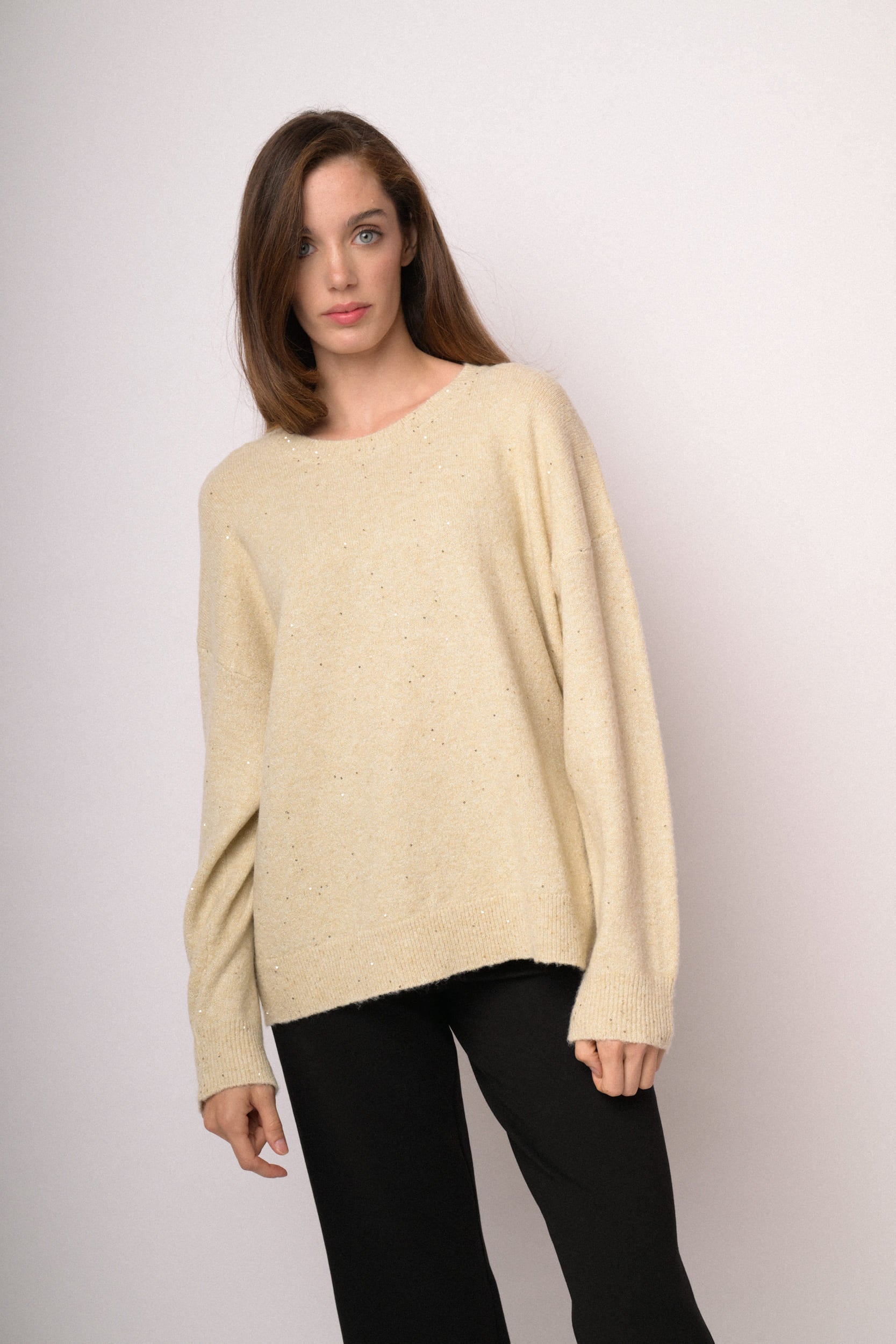 Maglia over con paillettes rosa cipria