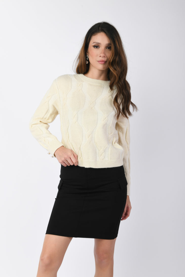 Pull con motivo a trecce