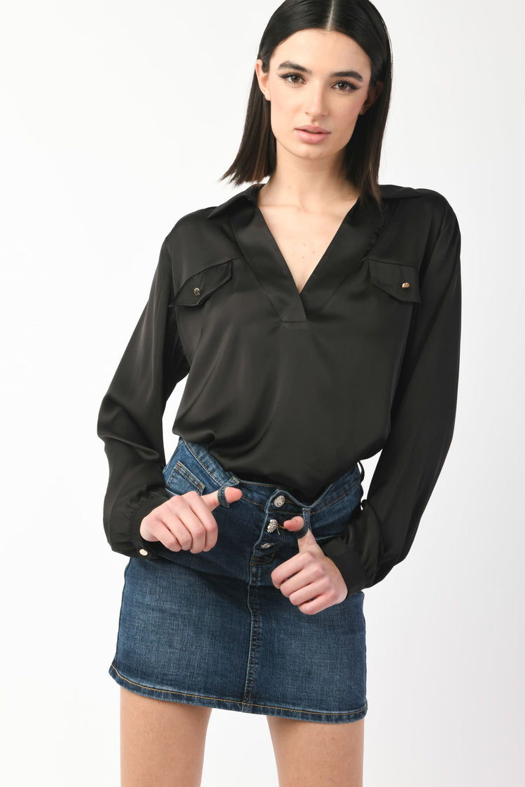 Blusa con taschini