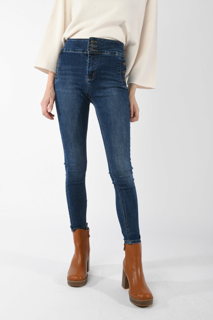 Jeans skinny con bottoni