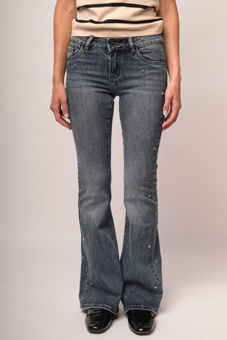 Jeans zampa con stelle e strass