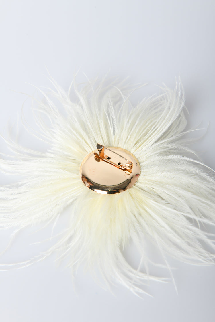 Spilla a fiore con piume