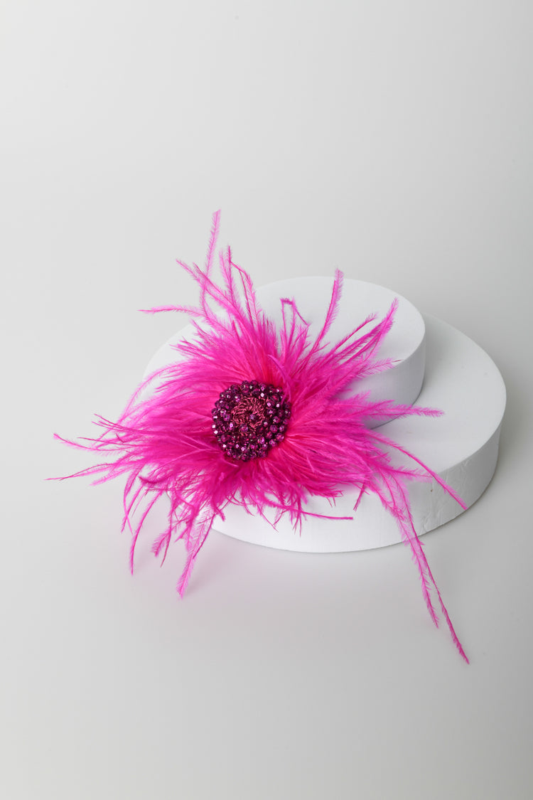 Spilla a fiore con piume