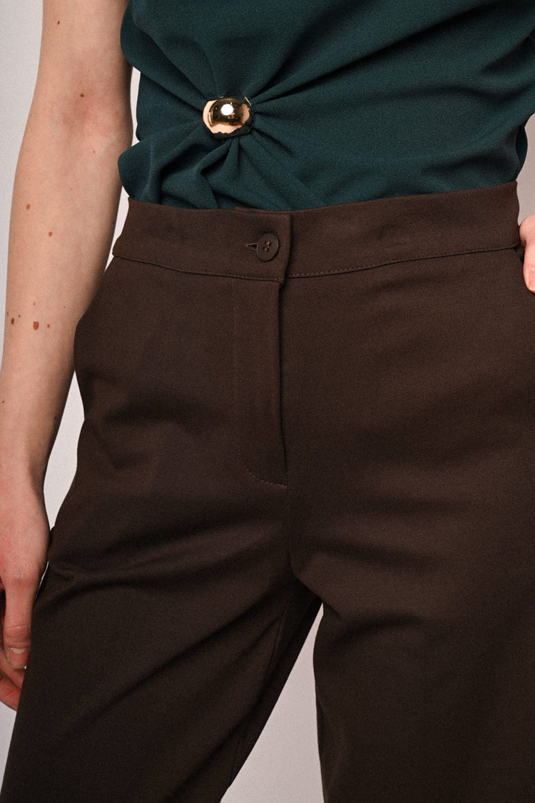 Pantaloni palazzo con risvolto testa di moro