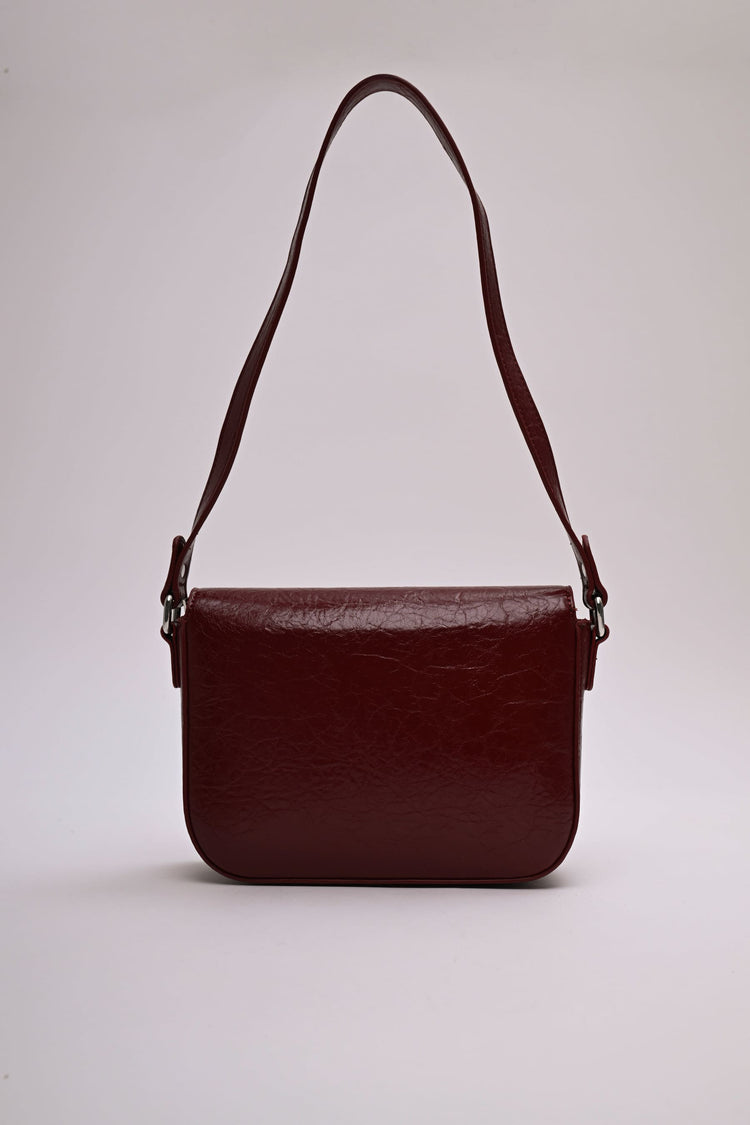 Borsa a spalla in similpelle martellata