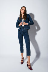 Jeans con mini borchie