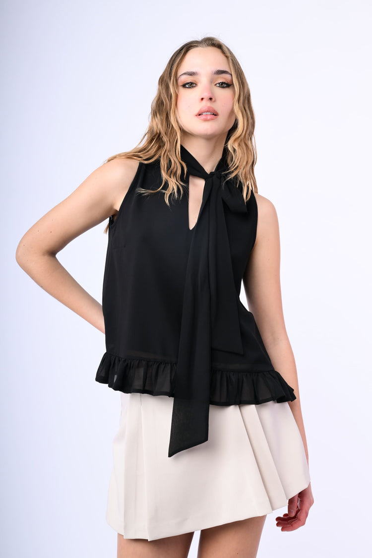 Top con fiocco e volant