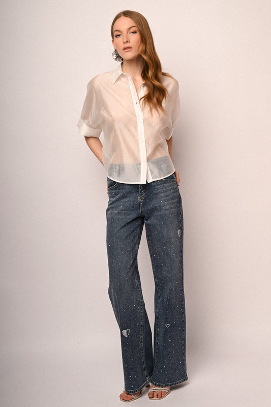 Jeans con cuori strass