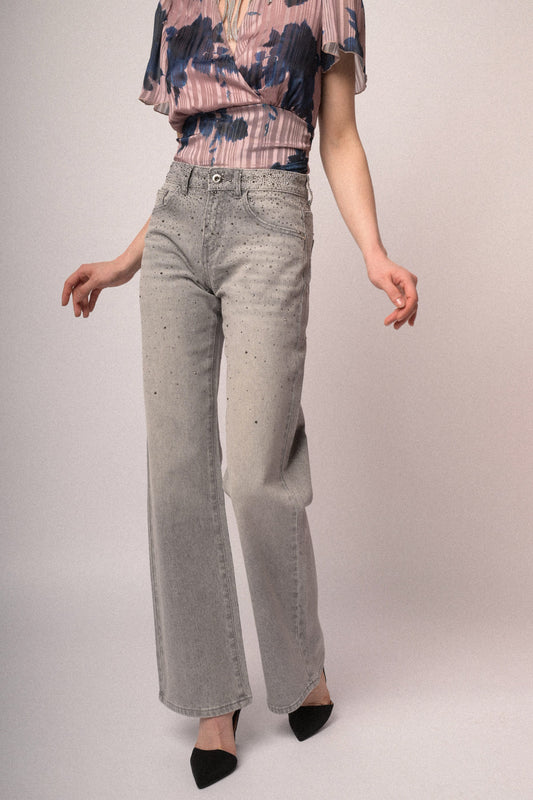 Jeans a zampa borchie