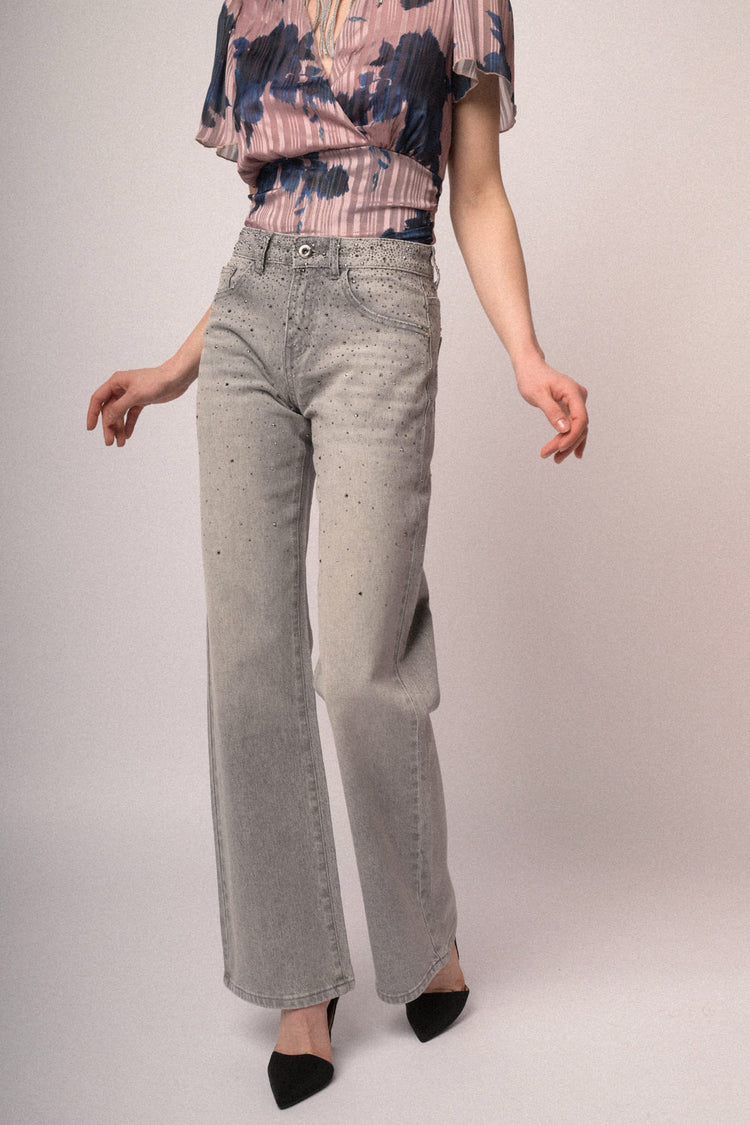 Jeans a zampa borchie