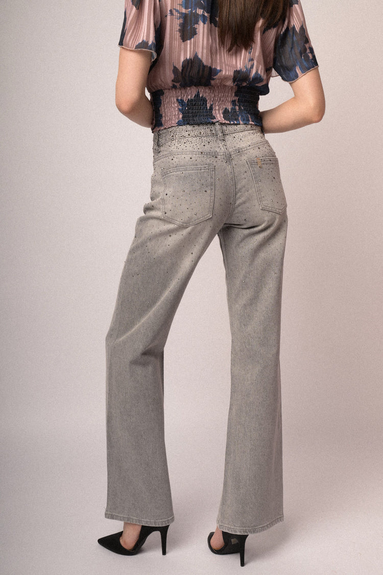 Jeans a zampa borchie