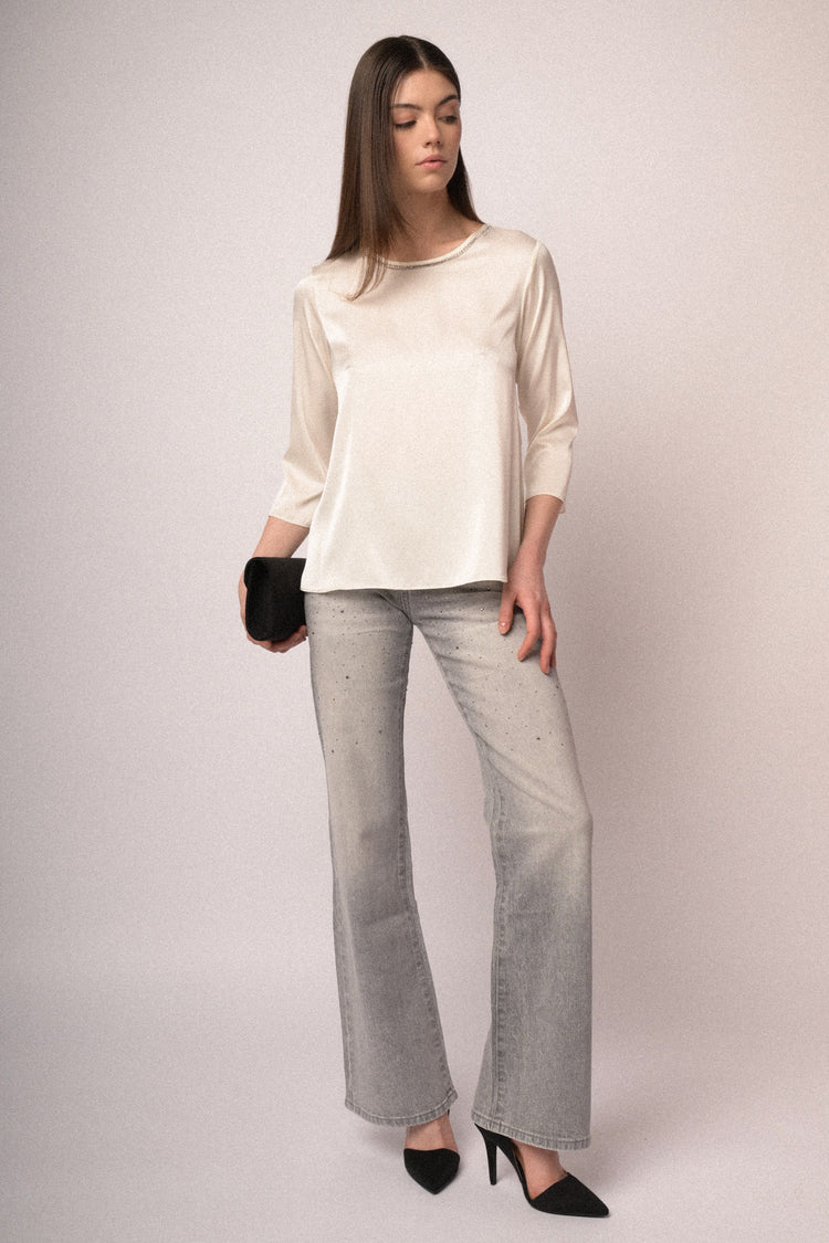 Jeans a zampa borchie