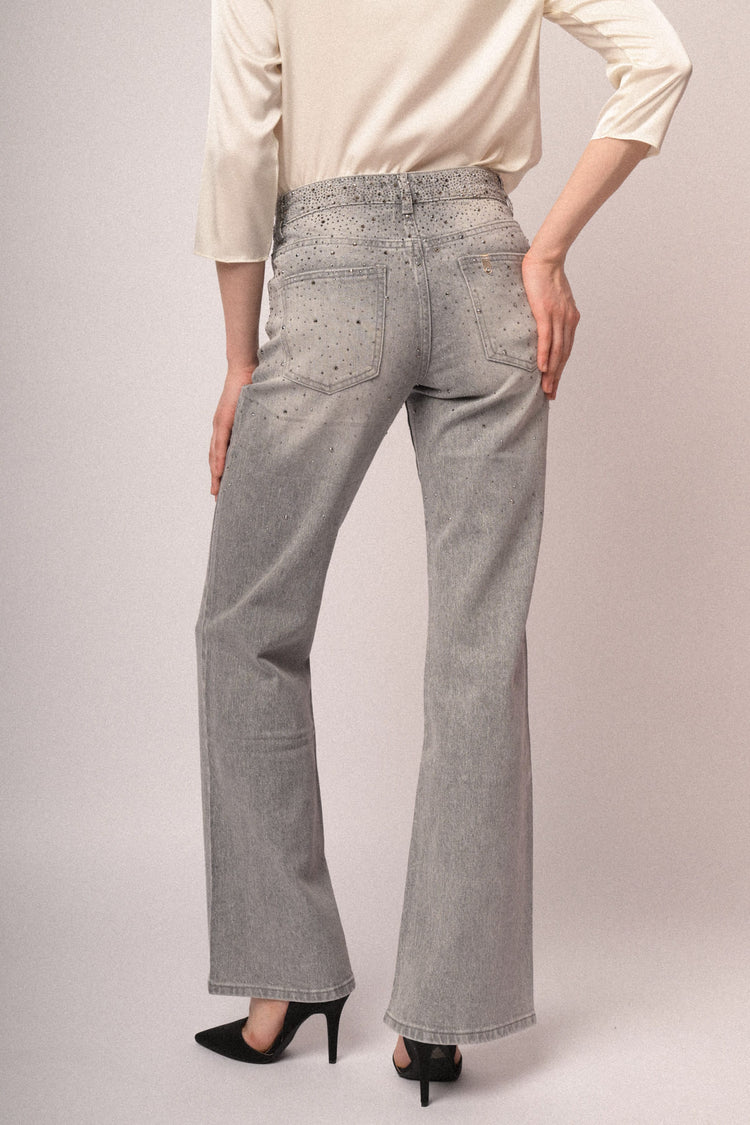 Jeans a zampa borchie