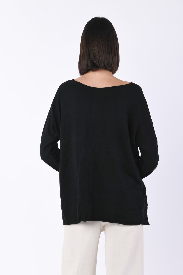 Pull oversize con spacchetti