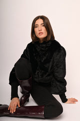 Giacca in faux fur con maniche in maglia