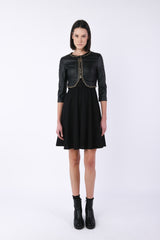 Giacca in similpelle con catenelle