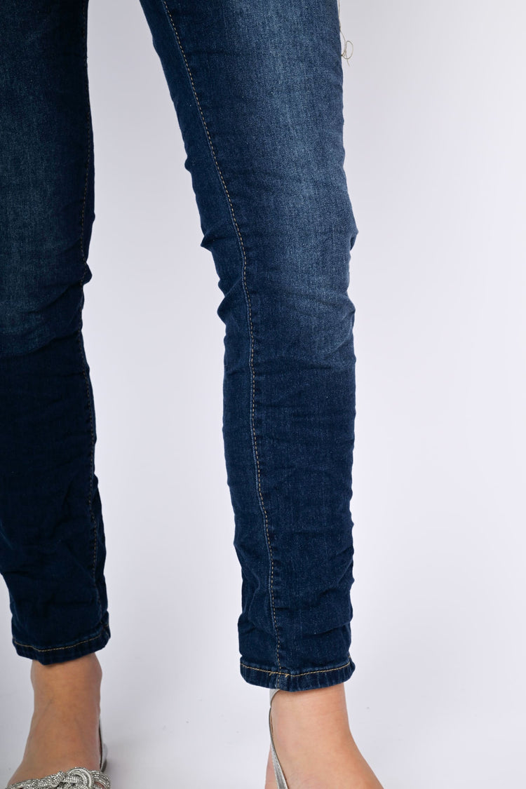 Jeans skinny con cintura