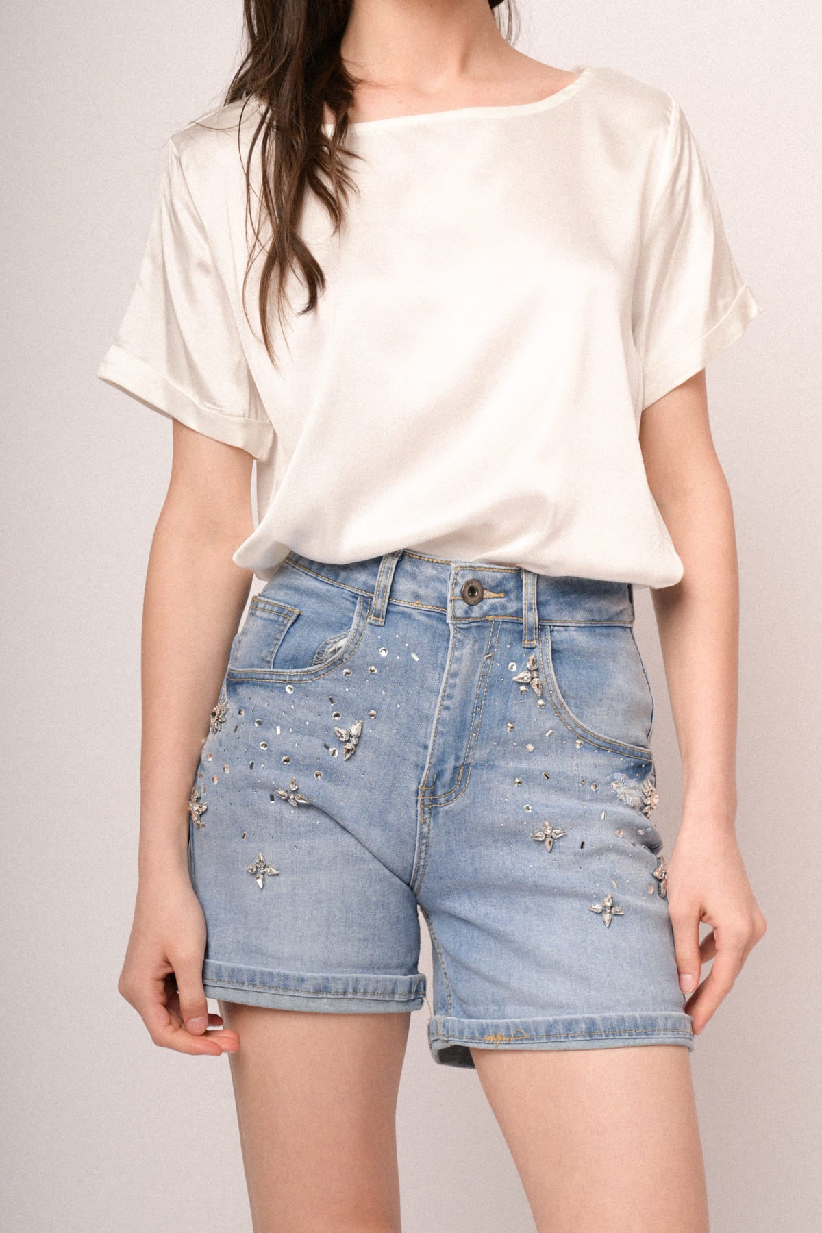 Shorts denim con applicazioni