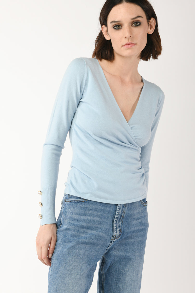 Pull con bottoni gioiello