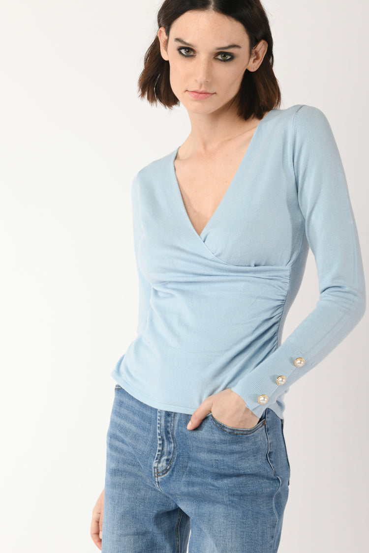 Pull con bottoni gioiello