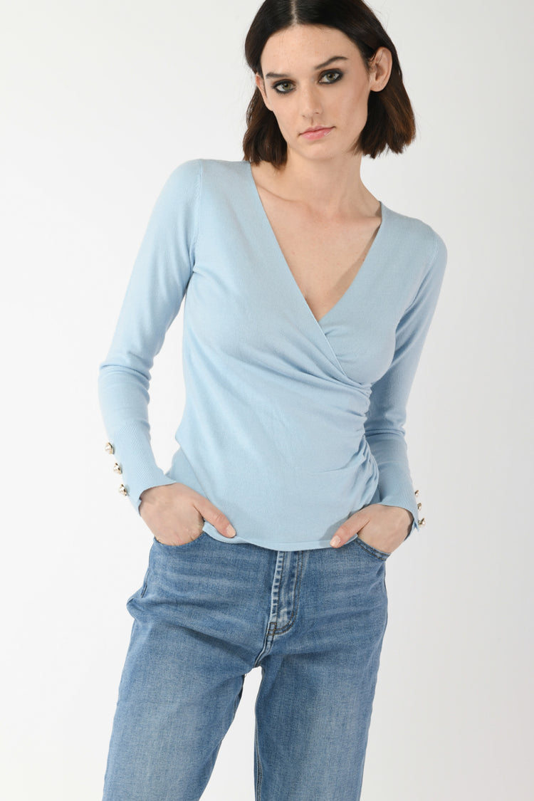 Pull con bottoni gioiello