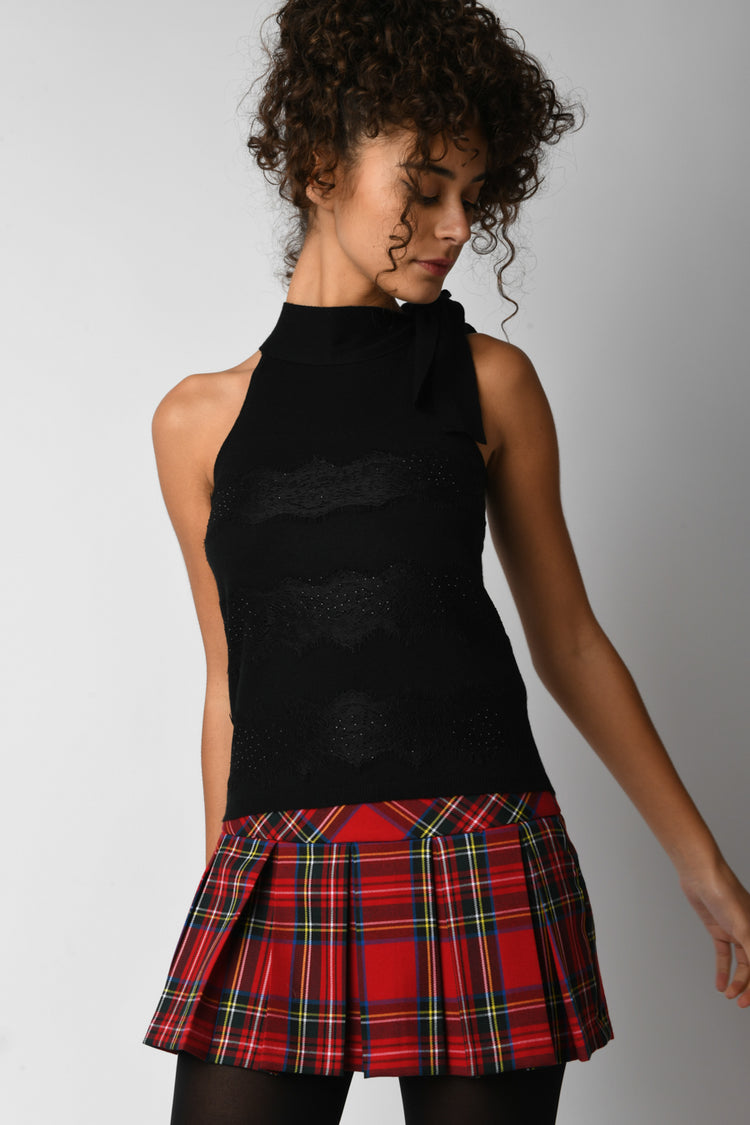 Top con bande in pizzo e fiocco