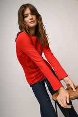 Pull con fili pendenti in strass