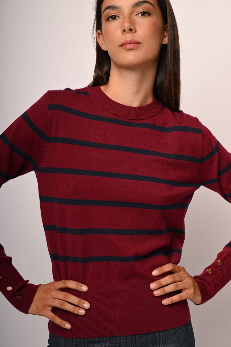 Pull a righe con bottoni ai polsini
