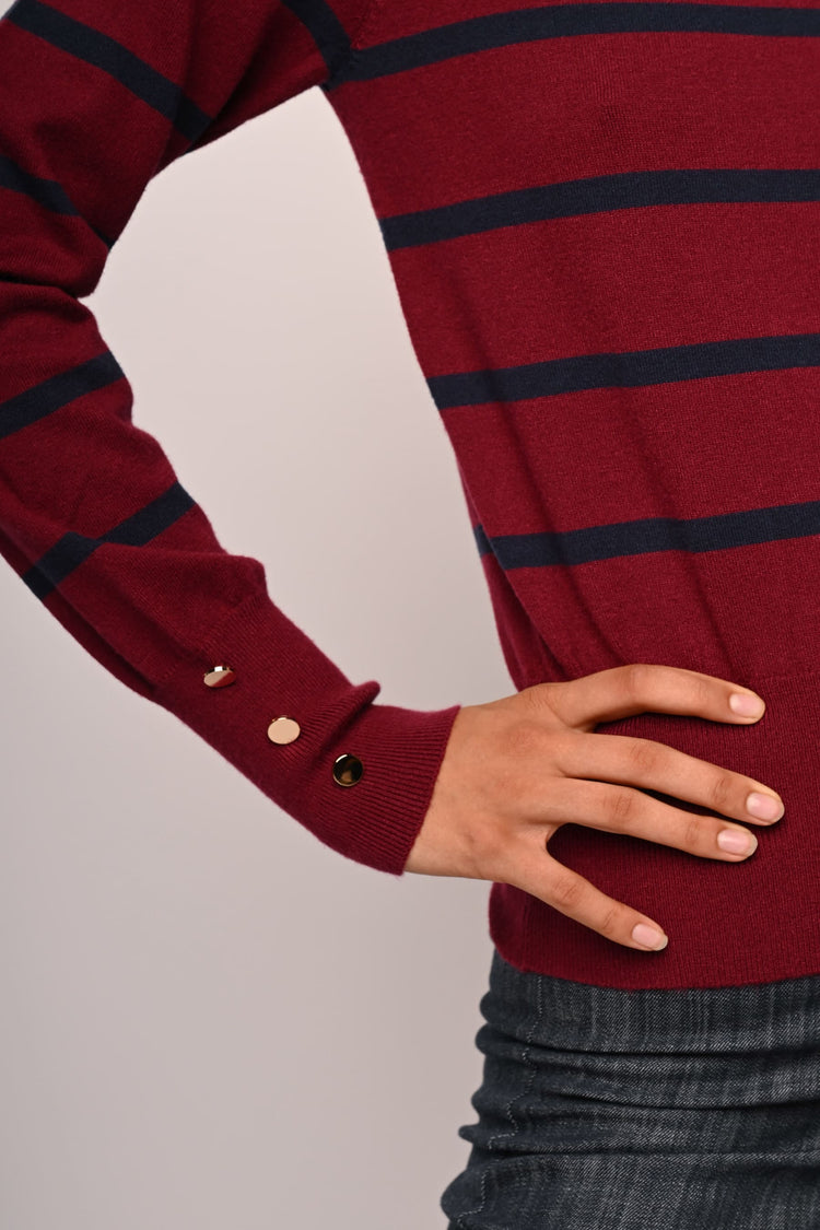 Pull a righe con bottoni ai polsini