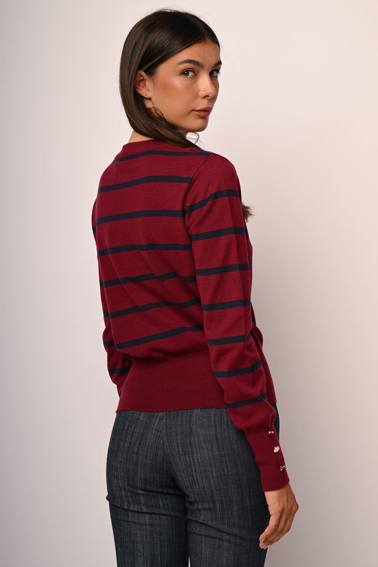 Pull a righe con bottoni ai polsini