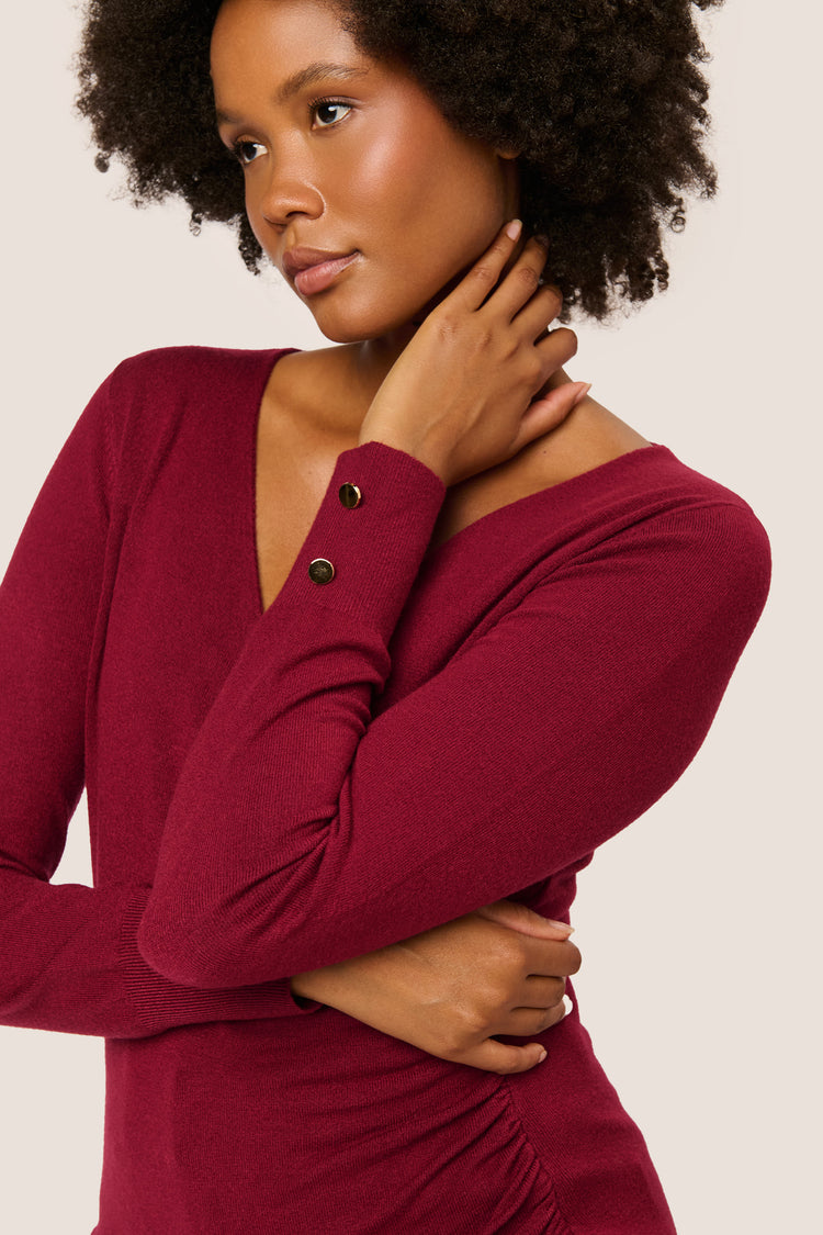 Pull incrociato con bottoni