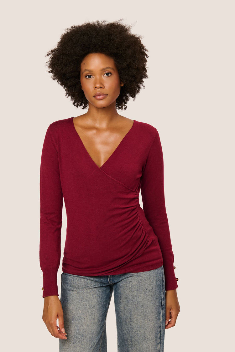 Pull incrociato con bottoni